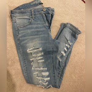 Distressed light washed jeggings